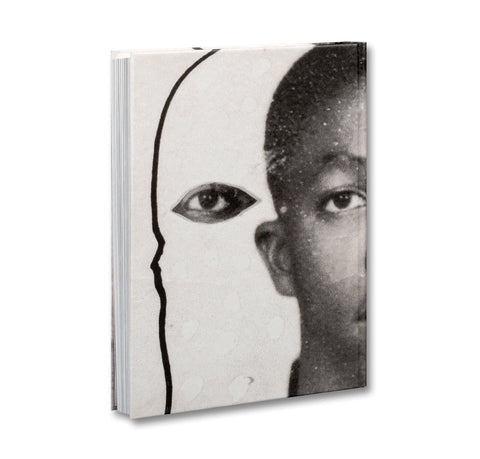 Photography book by MACK featuring artistic images of passports, showcasing detailed passport covers and travel-themed photography.